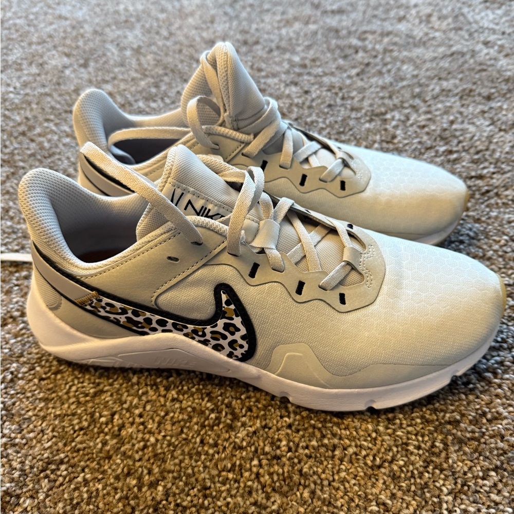 SOLD🛑‼️Nike White Sneakers with Black Leopard Swoosh